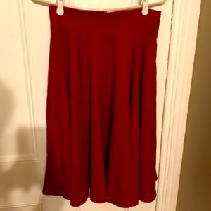 Beautiful Red Swing Skirt below the knew